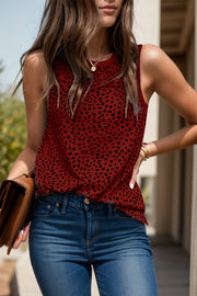 Burgundy dotted print tank top with contrast trim neckline and armholes.