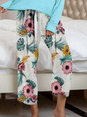 Botanical print lounge pants with tie waist and cropped leg