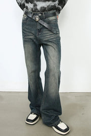 Faded flare denim jeans in dark vintage wash with a bootcut leg.