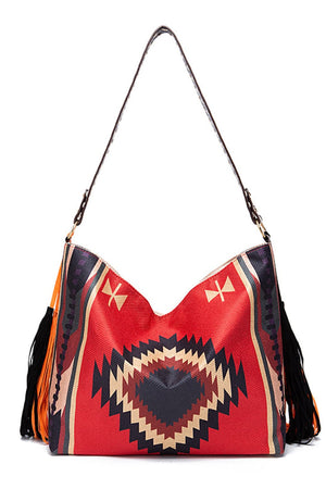 Southwestern fringe hobo bag in red with geometric pattern and canvas material.
