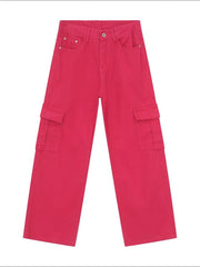 Oversized cargo denim trousers in hot pink with multiple pockets.