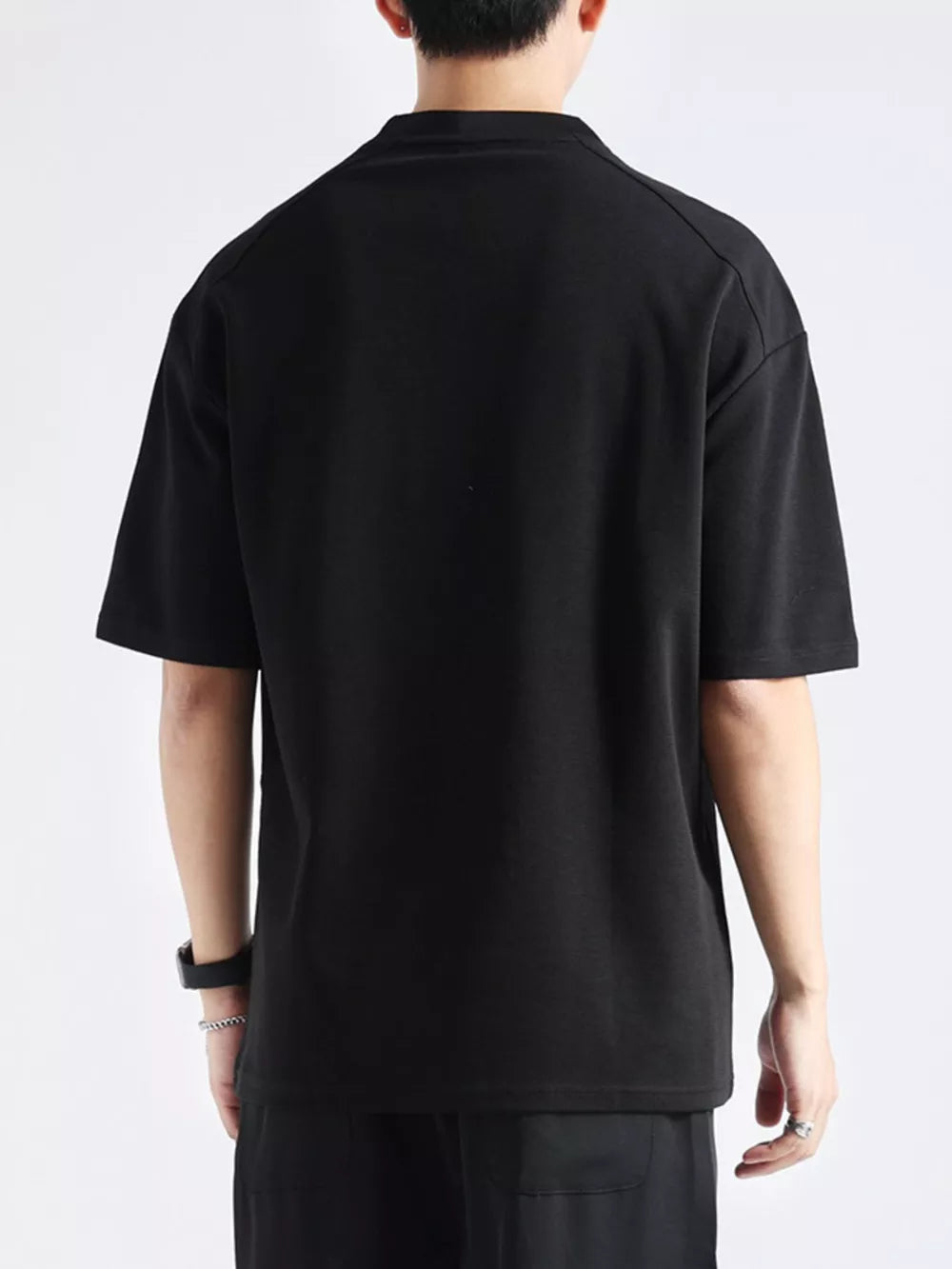 Men's black cotton short sleeve tee with a crew neck.