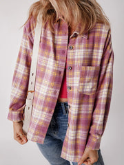 Oversized pink plaid shacket with button-down front and chest pocket.
