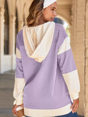 Color block waffle knit oversized sweatshirt with cream hood and sleeves.