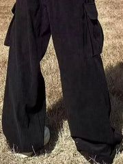 Black ribbed cargo joggers with spacious side pockets and a relaxed fit.