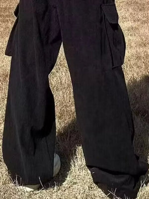 Black ribbed cargo joggers with spacious side pockets and a relaxed fit.