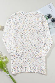 Confetti knit open-front cardigan in ivory with colorful speckles.