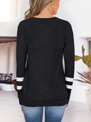 Black raglan v-neck top with varsity stripes on sleeves