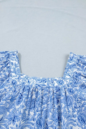 Floral pleated blouse with square neckline in blue and white polyester