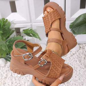 Brown woven texture high wedge sandals with adjustable buckle straps and chunky sole.