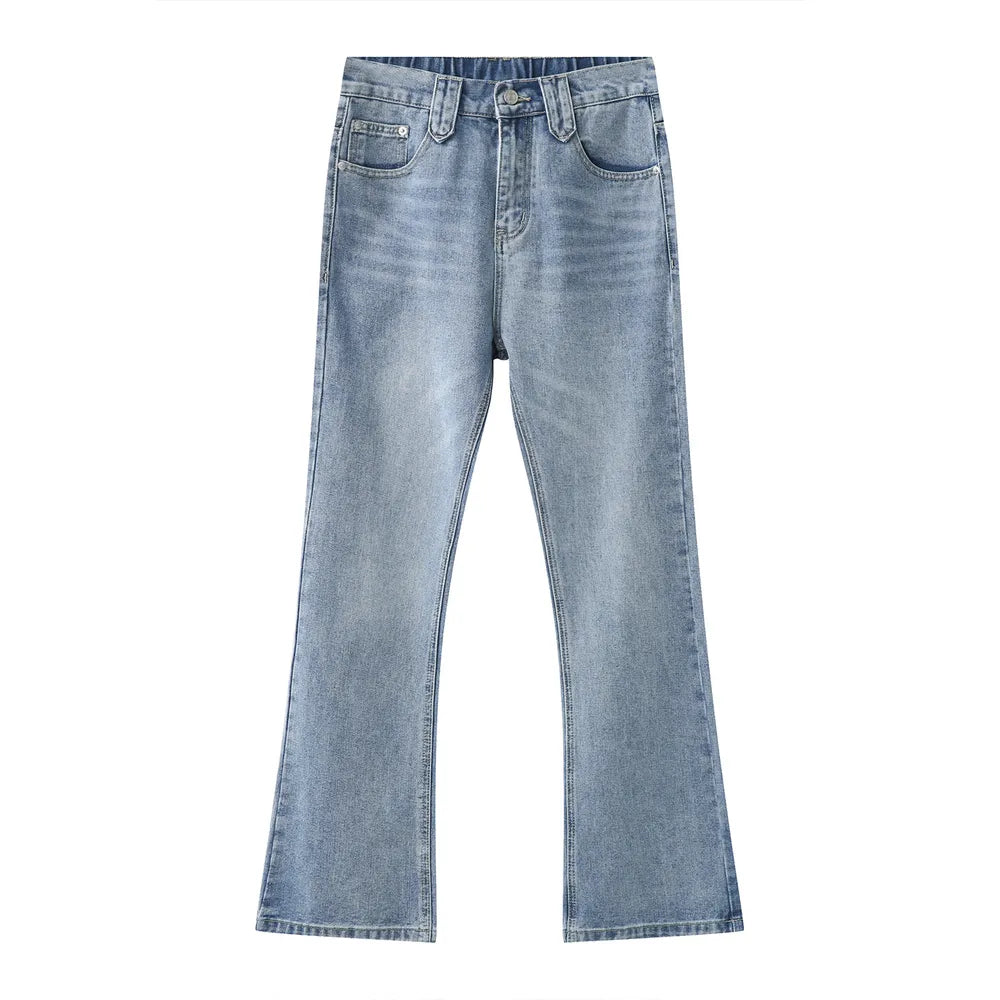 Medium wash wide-leg denim jeans with carpenter pockets and a flared hem.
