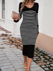 Black and white striped knit midi dress with V-neck and long sleeves.