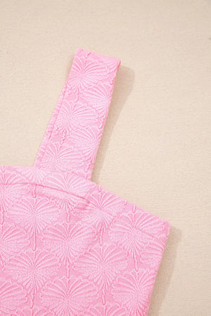 Pink textured square neck tank top with floral pattern and wide straps.
