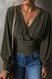 Army green draped bodice wrap bodysuit with ruched waist and long sleeves.