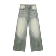 Men's wide leg jeans in a light wash denim with a gradient effect and distressed details.