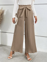Camel pleated palazzo trousers with tie waist and wide legs.