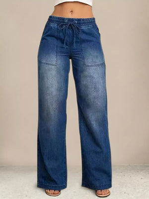 Light blue denim maternity jeans with drawstring waist and wide leg