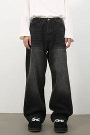 Oversized dark fade wash denim jeans with a wide leg