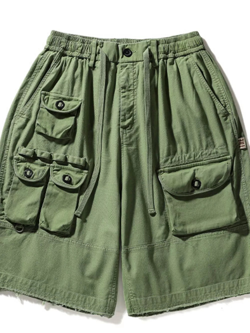 Green men's cargo shorts with multiple pockets and drawstring waist.