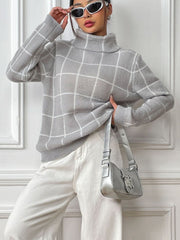 Gray turtleneck knit pullover sweater with a white grid pattern, long sleeves, and ribbed cuffs.