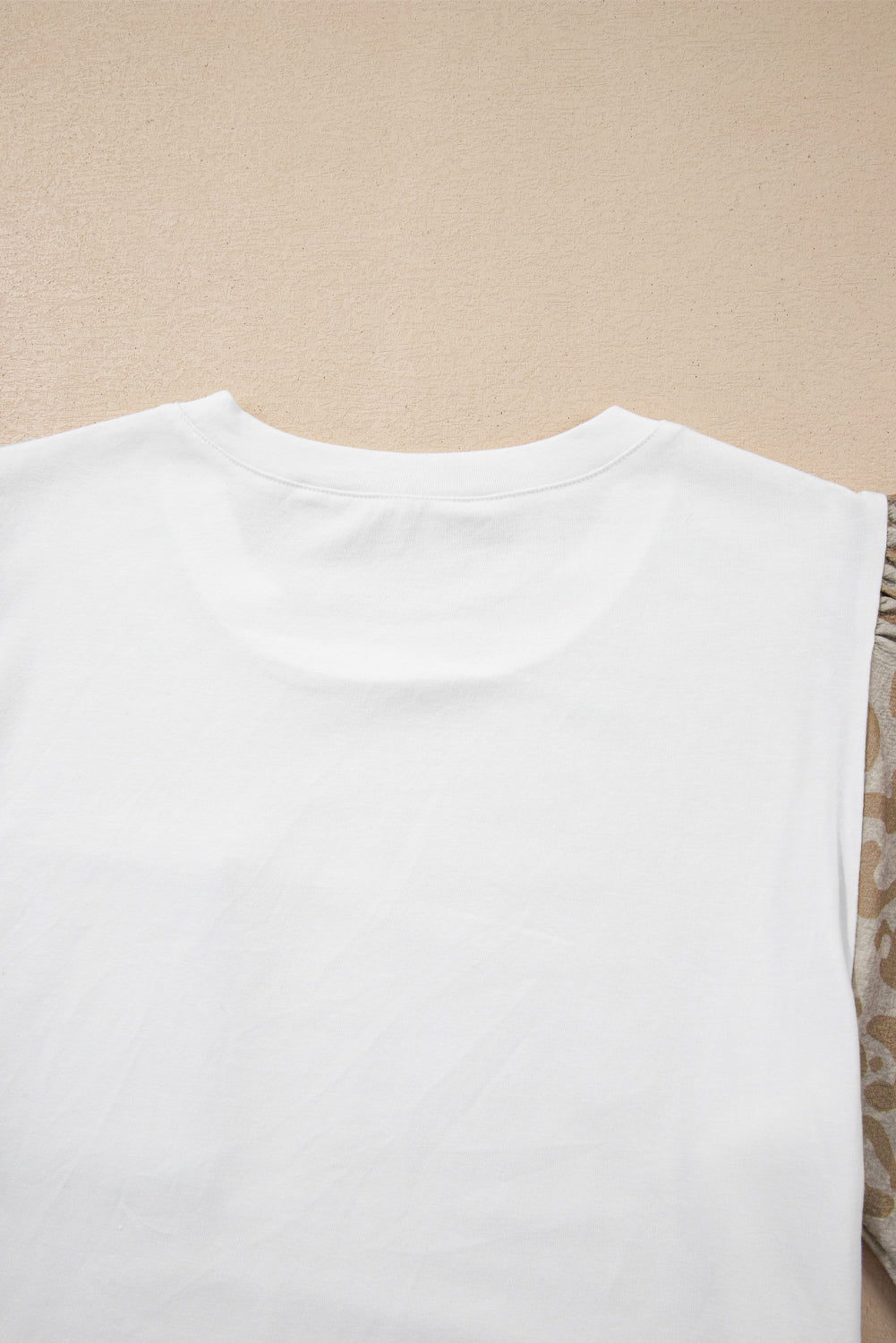 White cotton t-shirt with leopard print sleeves and crochet detail