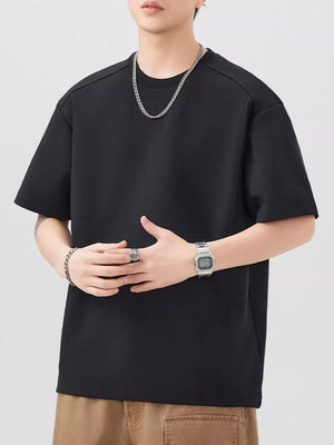 Oversized black cotton blend men's t-shirt with crew neck and short sleeves.