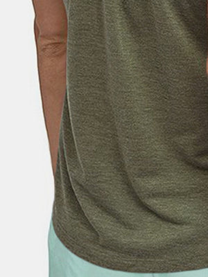 Racerback tank top in matcha green with a textured knit fabric.