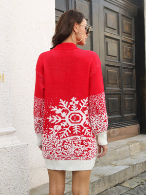 Red knit mini dress with white snowflake intarsia pattern and white cuffs.