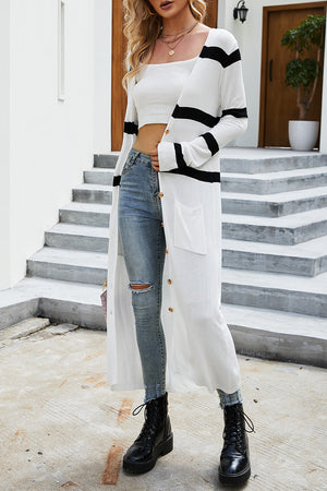 Longline white striped knit cardigan with buttons and pockets, open front.