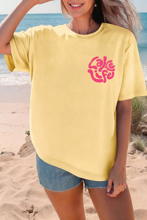 Yellow polyester t-shirt with distressed pink "Lake Life" graphic on chest.