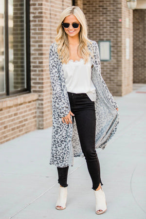 Long leopard print duster cardigan in cloudy blue with an open front and long sleeves.