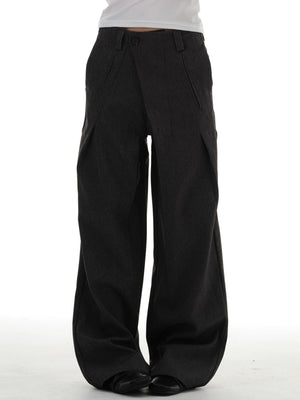 Men's black wide-leg pleated trousers with a comfortable drape.