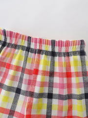 Baby shorts with elastic waistband in colorful plaid pattern