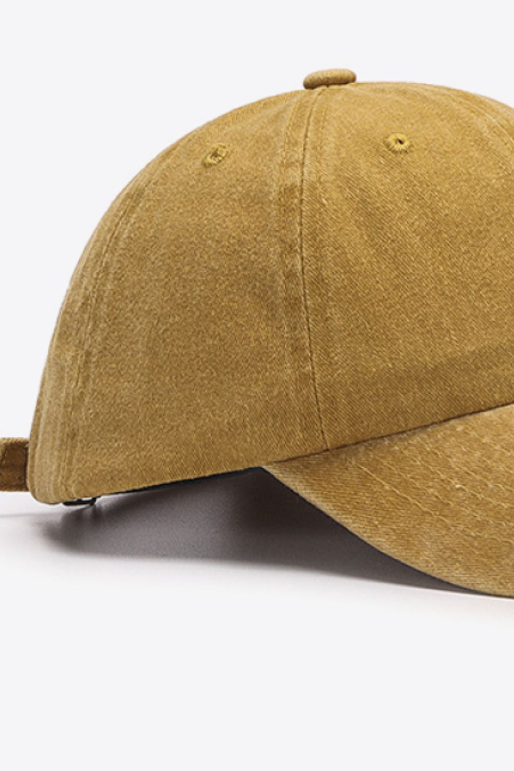 Washed cotton baseball cap in Khaki with adjustable strap detail.