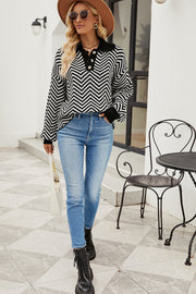 Chevron knit polo sweater in black and white with button detail.