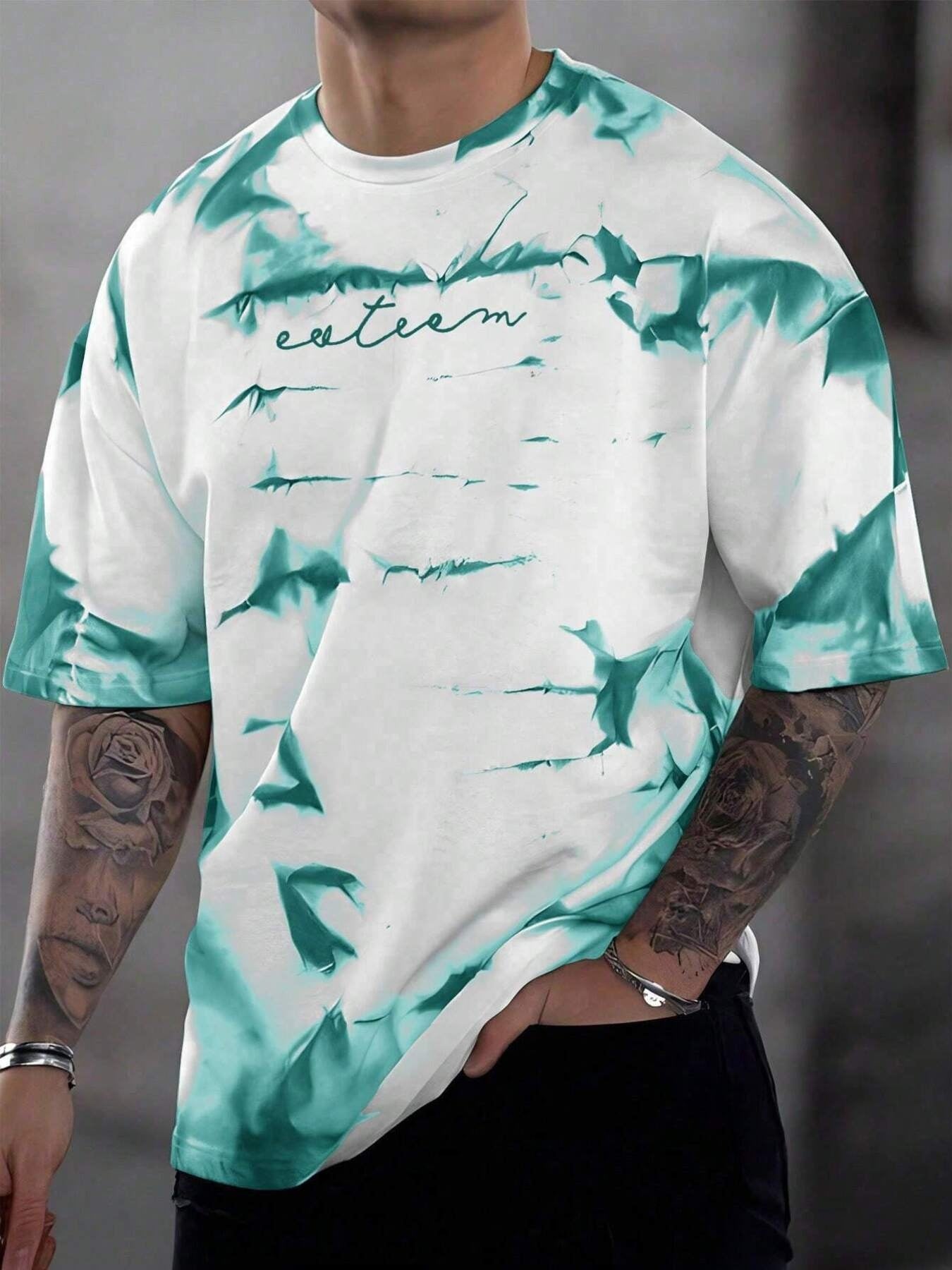 Abstract tie-dye oversized men's t-shirt in turquoise and white cotton with crew neck.