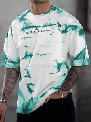 Abstract tie-dye oversized men's t-shirt in turquoise and white cotton with crew neck.