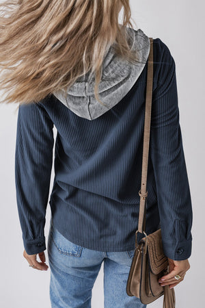 Corduroy shirt jacket in French Blue with contrast gray hood and button cuffs.