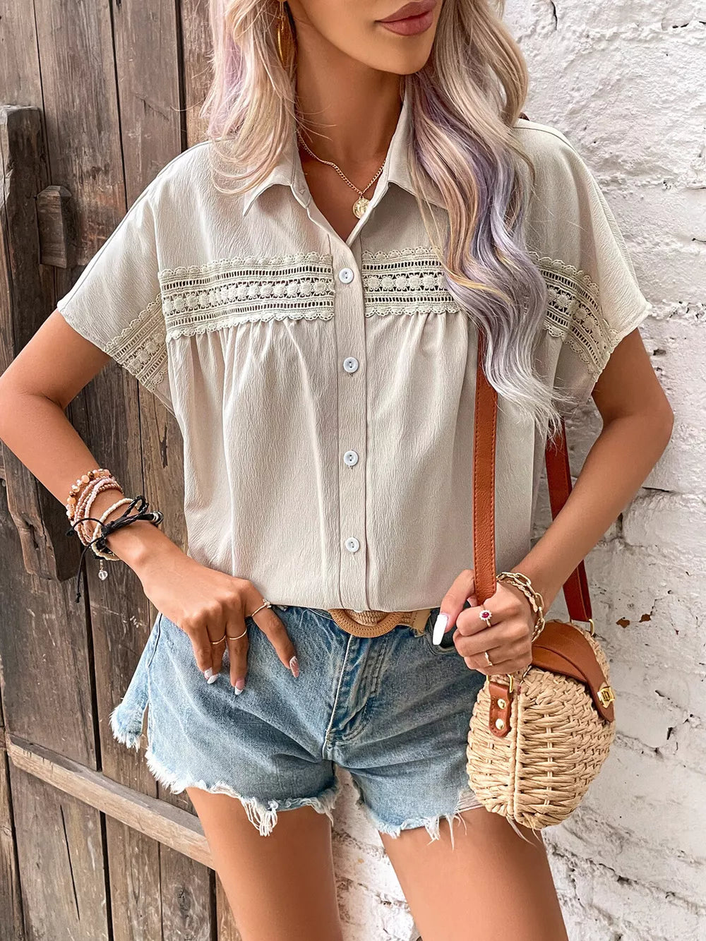 Apricot lace-trimmed button-up shirt with classic collar and short sleeves.