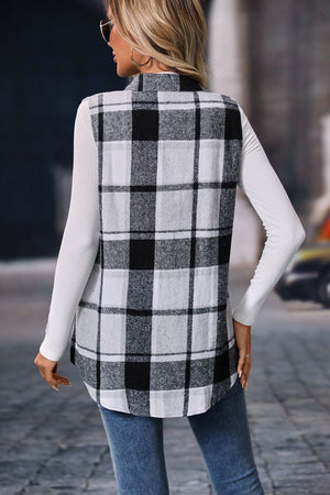 Plaid utility vest in black and white, 100% polyester, buttoned, with patch pockets.