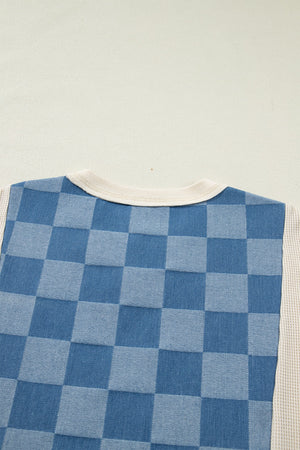 Maternity T-shirt with blue checkered denim front and cream waffle knit sleeves.