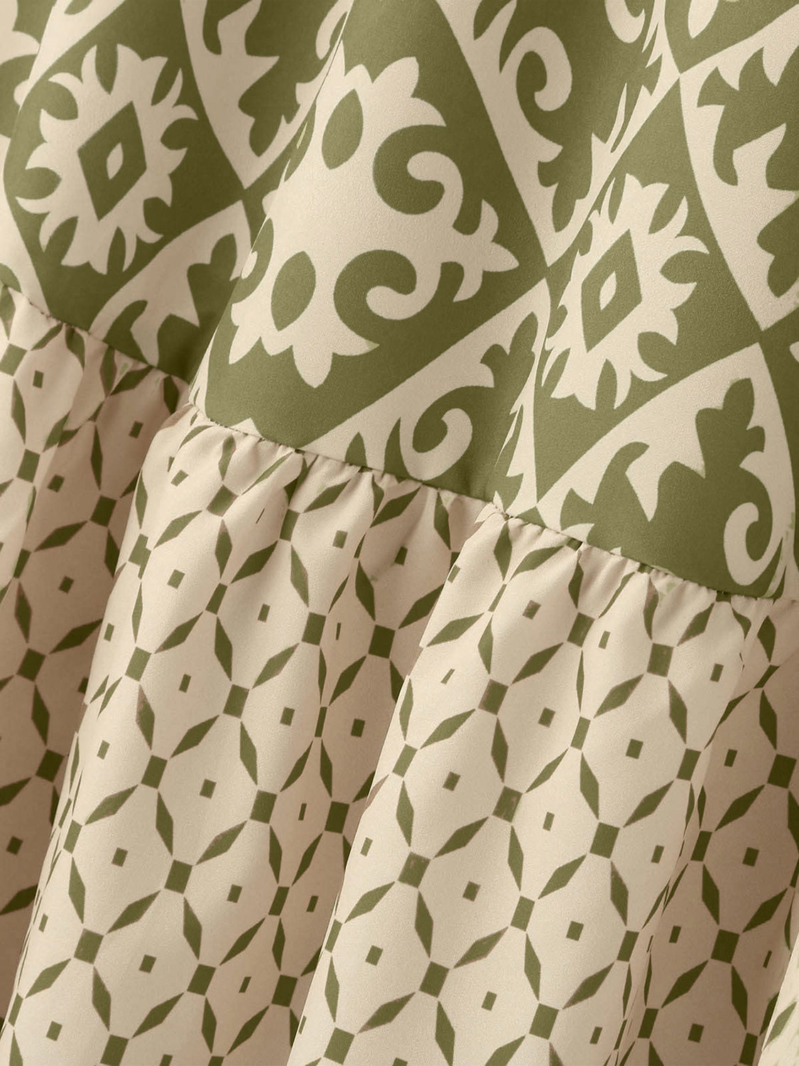 Tiered maxi skirt in matcha green with medallion and diamond prints.