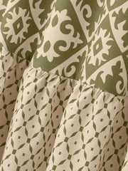 Tiered maxi skirt in matcha green with medallion and diamond prints.