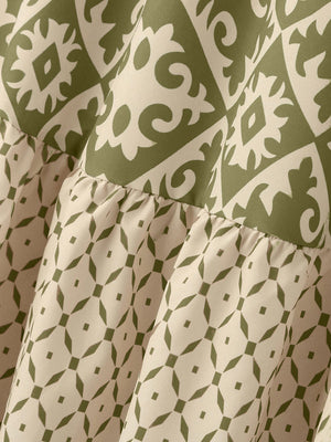 Tiered maxi skirt in matcha green with medallion and diamond prints.