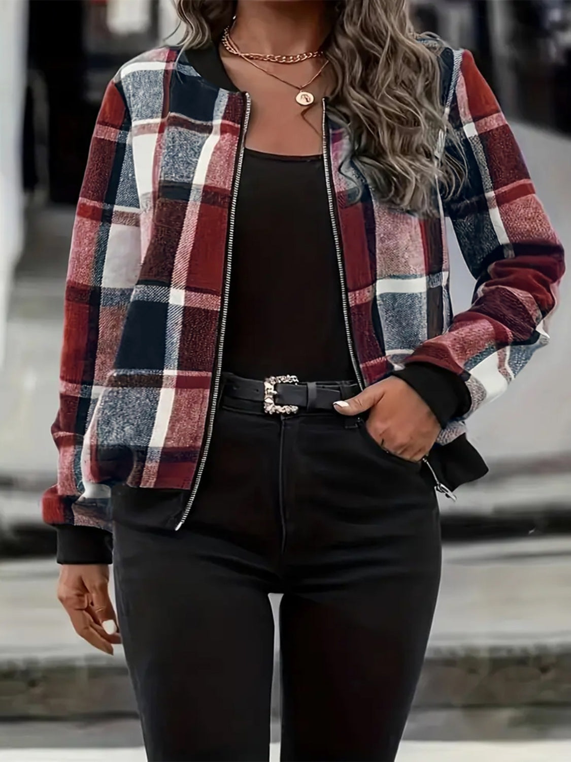 Plaid bomber jacket with ribbed cuffs and collar, zip front, in red, white, and navy plaid.