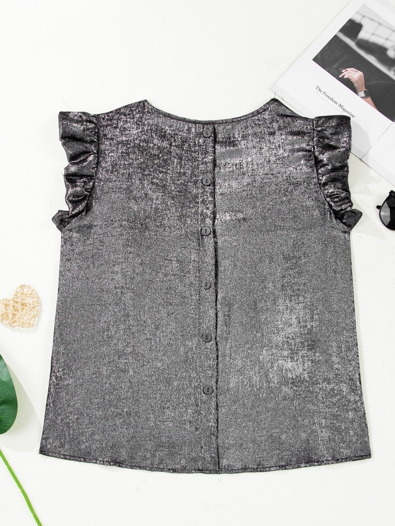 Elegant silver ruffled neck tank top with button front and cap sleeves.