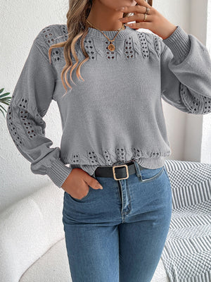 Gray acrylic knit sweater with openwork detail on sleeves and neckline.