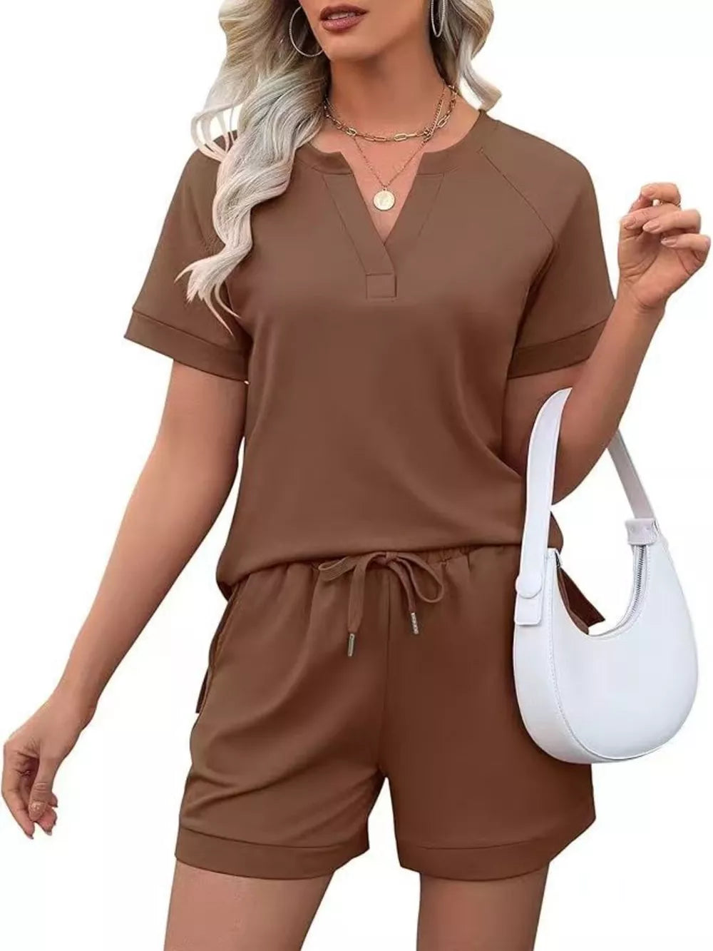 Brown two-piece set with V-neck top and drawstring shorts with pockets.