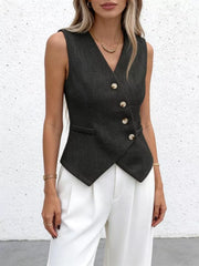 Black asymmetrical V-neck buttoned vest with gold buttons.