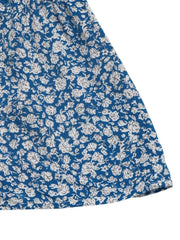Light blue ditsy floral mini skirt with a ruffled hem detail.